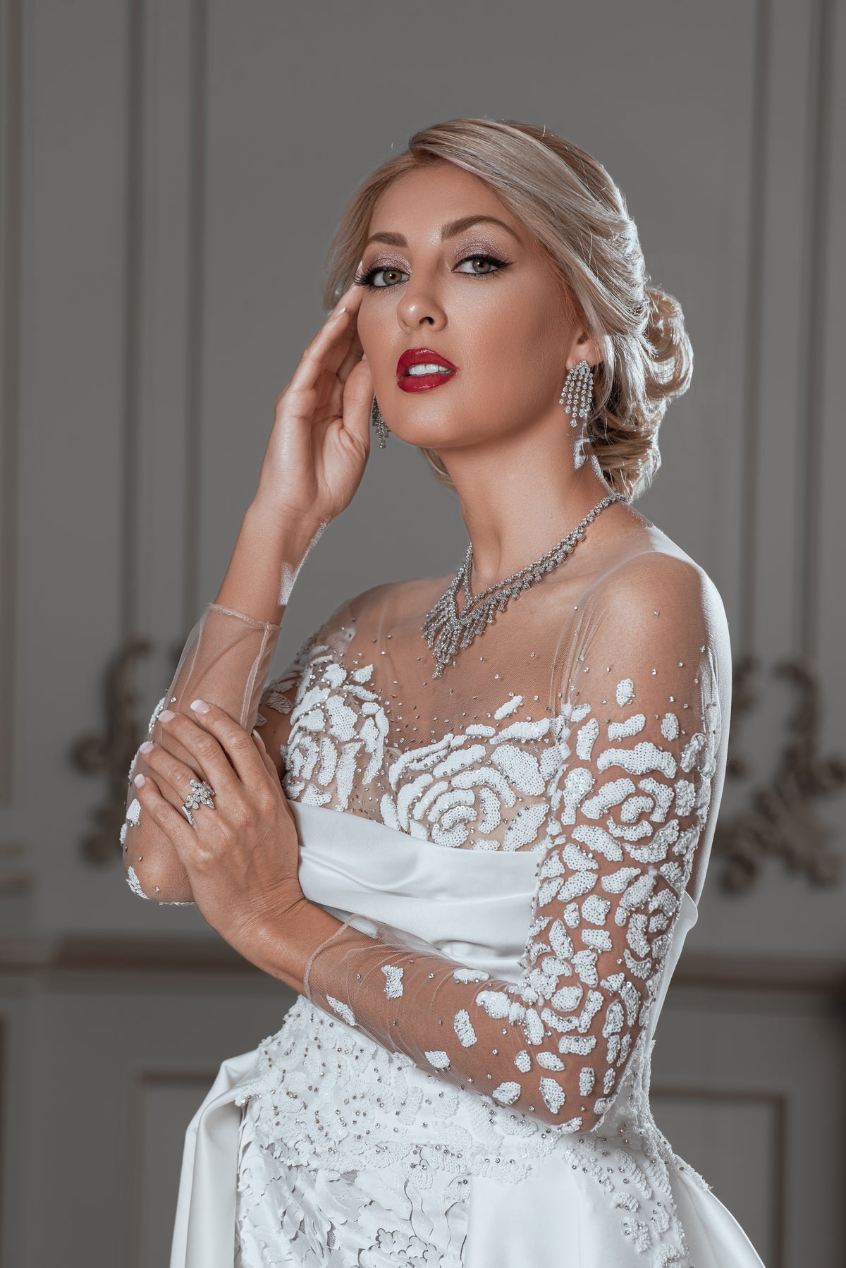 Embellished Lace Bridal Gown with Dramatic Over-Skirt