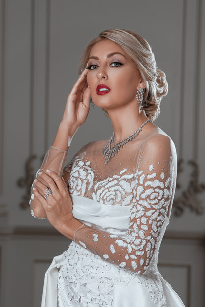 Embellished Lace Bridal Gown with Dramatic Over-Skirt