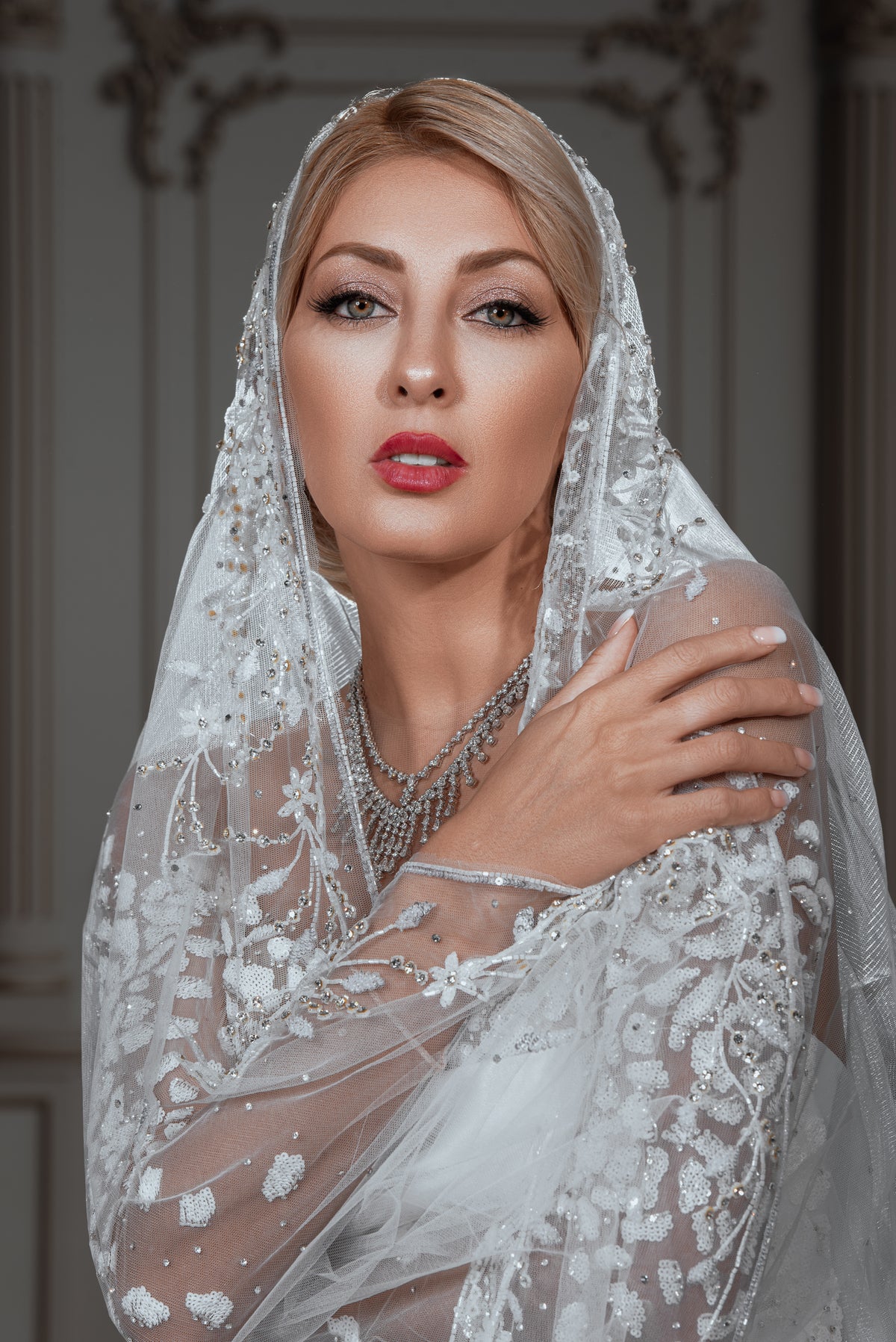 Embellished Lace Bridal Gown with Dramatic Over-Skirt